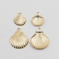 14K Gold Filled Shell Charm, Gold Filled Nautical Charm, Shell Charm, Sea Charm, Beach Charm, Bracelet Charm, Necklace Charm material: 14k gold filled, gold filled size: small 7.7*8.8mm, thickness 0.6mm medium 11*13.8mm, thickness 0.9mm Gold Nautical Jewelry For The Beach, Gold Nautical Jewelry For Beach, Nautical Style Gold Jewelry For The Beach, Gold Ocean-inspired Shell For Jewelry Making, Gold Ocean-inspired Shells For Jewelry Making, Beach Charm Bracelet, Necklace Charm, Bracelet Charm, French Riviera