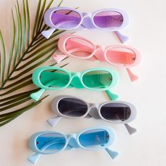 The Belinda Small Oval Sunnies are a trendy and retro-inspired accessory that is perfect for adding a pop of pastel-colored fun to any outfit. The small oval frame design provides a classic look that is flattering for most face shapes, while the pastel-colored lenses add a touch of playfulness and style. These sunglasses are perfect for those who love to experiment with unique colors and styles, while also staying on-trend. The lightweight construction of the sunglasses makes them comfortable to Trendy Oval Sunglasses For Summer, Oval Frame Design, Cute Crop Tops, Oval Frame, Retro Sunglasses, Retro Inspired, Unique Colors, Face Shapes, Frame Design