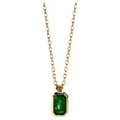 14K Yellow Gold 0.45CT Radiant Emerald Pendant ,Bezel Setting Product Description: Unveiling our Radiant Emerald Gold Pendant, a celebration of elegance and timeless beauty captured in 14K yellow gold. This pendant, featuring a 0.45CT radiant emerald with a bezel setting, is a masterpiece that exudes grace and refinement. 14K Yellow Gold 0.45CT Radiant Emerald Pendant with Bezel Setting Highlights: Vivid Radiant Emerald: The heart of this pendant is a 0.45CT radiant emerald, chosen for its lush Classic Diamond Cut Emerald Necklace For Formal Occasions, Classic Emerald Necklace With Diamond Cut For Formal Occasions, Classic Diamond-cut Emerald Necklace For Formal Occasions, Timeless Gold Emerald Necklace, Classic Emerald Necklace With Bezel Setting, Refined Gold Emerald Cut Jewelry, Classic Yellow Gold Emerald Cut Necklace, Elegant Gold Emerald Necklace With Brilliant Cut, Classic White Gold Emerald Necklace