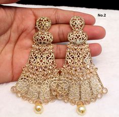 *gold finish light weight earrings set. Gold Kundan Filigree Earrings, Heavy Gold Bridal Drop Earrings, Gold Bridal Earrings With Stone Work For Celebrations, Gold Chandelier Drop Earrings With Stone Work, Gold Drop Earrings With Stone Work, Gold Stone Work Jhumkas, Heavy Gold Earrings For Party, Gold Heavy Earrings For Party, Gold Danglers With Stone Work