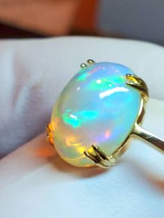 If you like blue you will love this stone, several shades of blue including purple, plus some yellow and orange fire. Mounted on a very low profile simple design 14k solid gold double prong ring. Opal Promise Ring, Vintage Opal Engagement Ring, Purple Opal, Natural Opal Ring, Prong Ring, Jewelry Opal, Ring Purple, Opal Engagement, Engagement Rings Opal