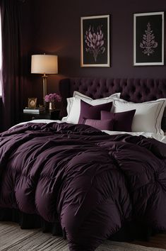 a bed with purple comforter and pillows in a bedroom