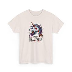 "Unicorn Halloween" Embrace the spooky magic of Halloween with our "Unicorn Halloween" shirt! This unique design features a blood-soaked, fierce unicorn with a hauntingly beautiful mane, ready to make a statement. Accompanied by a sinister jack-o'-lantern and dripping blood effects, this artwork is perfect for those who love a mix of fantasy and horror. Crafted from high-quality, soft fabric, this shirt ensures comfort while you show off your Halloween spirit. Stand out in any crowd and celebrate the season with a touch of mythical fear. Get your "Unicorn Halloween" shirt today and let the enchantment of Halloween begin! Unisex Heavy Cotton Tee (Gildan 5000) Solid colors are 100% cotton; Heather colors are 50% cotton, 50% polyester; Sport Grey and Antique colors are 90% cotton, 10% polyest Unicorn Print Graphic Tee With Crew Neck, Dripping Blood, Unicorn Halloween, Hauntingly Beautiful, Boutique Stores, Halloween Spirit, Halloween Tees, Spirit Halloween, Jack O Lantern