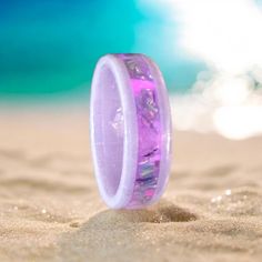 Unicorn Women's Ring - A Magical Fusion of Purple Ceramic, Pink Glow, Bello Opals & Herkimer Quartz ✨ Embrace the Magic ✨ Step into a world of enchantment with our "Unicorn" women's ring, where the mystical meets the modern. This exquisite piece is designed for those who believe in the beauty of the extraordinary. Features: Purple Ceramic Core: A smooth, durable base that radiates a sense of calm and serenity. Pink Glow Powder: Adds a mesmerizing glow, making the ring shimmer even in low light, capturing the essence of ethereal beauty. Bello Opals: Embedded within the band, these stunning opals reflect a spectrum of colors, reminiscent of a unicorn's magical aura. Herkimer Quartz: Known for its clarity and brilliance, this genuine quartz adds a touch of sparkle, elevating the ring's overal Glow Ring, Unicorn Ring, Purple Ceramic, Princess Toys, Rochester Ny, Ethereal Beauty, Low Light, Low Lights, Rings Statement