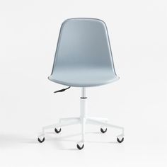 a blue office chair sitting on top of a white desk next to a computer mouse