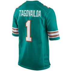 When Tua Tagovailoa is on the field, opposing teams take notice, so showcase your admiration of one of the top players in the NFL with this exclusive Miami Dolphins Game jersey from Nike. Complete with mesh panels for extra breathability, this jersey replicates the authentic one that Tua Tagovailoa wears every Sunday, giving you the perfect piece of gear for every Miami Dolphins game this season.When Tua Tagovailoa is on the field, opposing teams take notice, so showcase your admiration of one o Nike Tops For Football Season Sports Events, Nike Tops For Football Season, Nike Team Spirit Jersey For Sports Events, Nike Football Season Jersey With Team Name, Nike Football Season Jersey With Team Logo, Nike Team Jersey For Team Events, Nike Jersey With Team Name For Football Season, Nike Jersey With Team Name For Fans, Nike Football Season Jersey