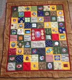 a patchwork quilt with patches on it