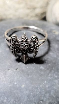 These rings are old store stock- unworn. The front of the ring is 1/2 of an inch tall. They are sterling silver .925. It will be shipped in a jewelry box for gifting.