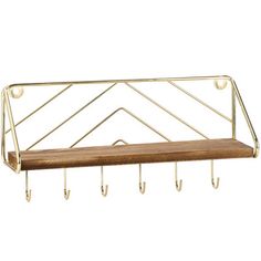 a gold metal shelf with hooks on the bottom and a wooden shelf below it that has two coats of coat hangers