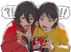 two girls are reading a book together