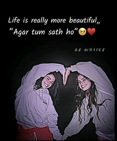 two young women standing next to each other in front of a black background with the words life is really more beautiful