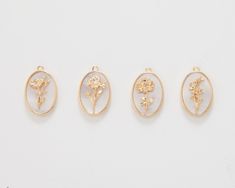 Item Details measurement: 10x14mm Material: Brass, Pearl Color: 14K Polished Gold Plated Quantity: 1 Piece , 12 Pieces Country of Origin : South Korea **Birth Month Flowers** January: Carnation February: Iris March: Daffodil April: Daisy May: Lily of the Valley June: Rose July: Water Lily August: Poppy September: Aster October: Marigold November: Chrysanthemum December: Poinsettia Gold Oval Jewelry With Flower Charm, Gold Jewelry With 3d Flowers For Jewelry Making, Anniversary Jewelry With Pressed Flowers In White, Anniversary Jewelry With Pressed Flowers, Delicate White Charms Jewelry, Delicate White Jewelry With Charms, Gold 3d Flower Jewelry Gift, Delicate Rose Gold Jewelry With 3d Flowers, Gold 3d Flower Jewelry For Gift