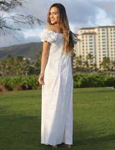 Maxi style dress, solid white background with accented white floral tropical design available in plus-size 100% Cotton Poplin Fabric Square Ruffled Neckline Ruffled Elastic Shoulders and Cap Sleeves Front and Back Flattering Darts Center Back Zipper Color: White Sizes: XS - 4XL Care: Machine Wash Cold, Cool Iron Made in Hawaii - USA SIZE XS0-2 S4-6 M8-10 L12-14 XL16-18 2XL20-22 3XL24-26 4XL28 BUST 31" 33" 35" 37" 40" 42" 44" 46" WAIST 34" 36" 38" 40" 42" 44" 46" 48" HIP 38" 40" 42" 44" 46" 48" 50" 52" LENGTH 51" 52" 53" 54" 55" 56" 56" 57" These measurements are from the garment and not from the person, measured on a flat surface from inseam to inseam. To select your size, we recommend measuring your garment and comparing it to this chart Hawaiian Wedding Dress, Honolulu City, Easy Wear Dresses, Sarong Dress, Muumuu Dress, Hawaii Usa, Cotton Poplin Fabric, Hawaiian Outfit, Ruffled Neckline