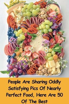 a large platter filled with lots of different types of fruits and veggies