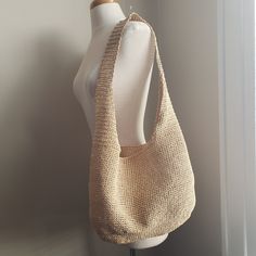 Stylish and simple designed crochet raffia bag for going to beaches, parks, towns ... everywhere in summer. Made with waterproofed paper raffia yarn.  It's soft, flexible, and strong! The color: Wheat beige ( the color of appearance depends on phones and PCs) Approximate measure  body: 15 inches (38 cm) x 9 inches (23 cm) bottom: 11 inches (28 cm) x  5 inches (12 cm) handle: 30 inches (76 cm) 100% paper raffia This yarn is waterproofed, but please avoid getting wet. Wipe clean No iron Spring Beach Shoulder Bag In Neutral Color, Neutral Shoulder Bag For Beach In Spring, Neutral Shoulder Bag For Spring Beach Outings, Lightweight Cream Crochet Bag For Summer, Summer Hobo Bag With Open Weave For Everyday Use, Summer Open Weave Hobo Bag For Everyday Use, Eco-friendly Cream Crochet Bag With Adjustable Strap, Cream Hobo Shoulder Bag For Beach, Neutral Shoulder Bag For Beach