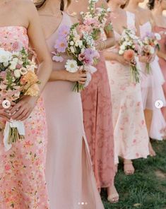 the bridesmaids are all wearing pink dresses and holding bouquets in their hands