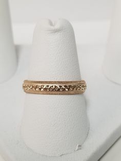 "Thanks for shopping our vintage estate store. We tend to sell well below wholesale and truly hope you enjoy all of our items. Many of the items are one of a kind, so please enjoy scrolling through the pictures and hopefully something will catch your eye. Brown spots are from the camera's reflection. Nice estate 14k yellow gold wedding band edged diamond cut design. Ring size: 6 Width: 4mm 3/16\" Weight: 2.46 grams Marked 14k as all our gold is marked or tested. We do not sell gold plated items. Heirloom Engraved Stackable Ring For Formal Occasions, Formal Heirloom Stackable Rings Stamped 14k, Gold Jewelry Stamped 14k For Marriage, Gold 14k Stamped Jewelry For Marriage, Heirloom Stackable Rings For Formal Occasions, Gold Milgrain Jewelry For Wedding, Classic Stackable Jewelry For Marriage, Vintage Stackable Jewelry With Round Band, Anniversary Yellow Gold Rings With Milgrain Detail