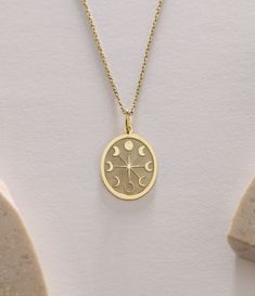 Gold Moon Pendant - Moon Phases Gold Necklace ● Material of pendant: Solid Gold 14k ( REAL GOLD ) ● Metal Stamp: 14k ( REAL GOLD ) ● The pendant is available in 5 sizes: - 12x17 mm / 0,47 x 0,66 inches - 13x18 mm / 0,51 x 0,70 inches  In the photos - 14x19 mm / 0,55 x 0,74 inches  - 16x21 mm / 0,62 x 0,82 inches  - 18x24 mm / 0,70 x 0,94 inches ( In the photos the size is 13x18 mm / 0,51 x 0,70 inches ) ( Jump Ring inner diameter: 4 mm ) ● Material of chain: Solid gold 14k ( REAL GOLD ) It is thin and dainty and it is available in 4 sizes: - 40 cm / 15,75 inches ( Length ) - 45 cm / 17,72 inches ( Length ) In the photos - 50 cm / 19,68 inches ( Length ) - 55 cm / 21,65 inches ( Length ) ● Backside engraving is FREE ( Please use the personalization box for that.) ● If you want larger size, Moon Phase Necklace, Moon Pendant Gold, Gold Crescent Moon, Everyday Wear Jewelry, Gold Moon Necklace, Moon Phases Necklace, Crescent Moon Pendant, Gold Moon, Gold Birthday