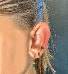 This beautiful 3 piercing set comes in 2 different colors, emerald green stone and black stone. everything can also be bought separately. Green Tarnish-resistant Huggie Jewelry, Elegant Green Dangle Huggie Earrings, Elegant Green Huggie Jewelry, Minimalist Green Gold-plated Earrings, Minimalist Single Green Earring, Green Huggie Earrings With Matching Set, Elegant Green Huggie Earrings, Dainty Green Huggie Jewelry, Green Dainty Huggie Jewelry