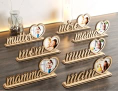 there are many wooden frames with pictures on them that spell out the names of each family