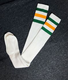 Size: O/S Length: 32" Condition: Mint / vintage - Circa late 90's - 2001 - authentic AA classic Retro White Cotton Socks, White Cotton Retro Socks, White Fitted Knee-high Sports Socks, Fitted White Knee-high Sports Socks, Retro White Socks For Winter, Casual Green Fitted Knee-high Socks, Green Fitted Casual Knee-high Socks, White Stretch School Socks, White Cotton School Socks