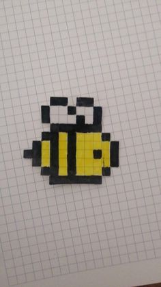 a piece of paper that has been made to look like a bee