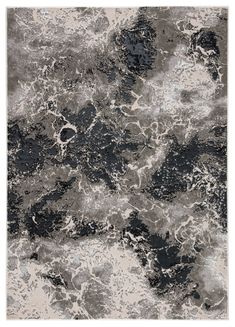 a black and white area rug with an abstract design on the bottom, in grey tones