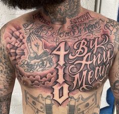 a man with tattoos on his chest and chest