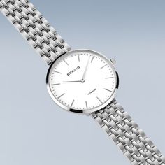 Ladies Titanium  New In: Our new ladies' watches from the Titanium Collection are truly eye-catching. Available in silver, gold and a bicolor look, they are the perfect choice for fashion-conscious women looking for an elegant and robust watch.  The watches are made of high-quality titanium. This material is extremely strong, ultra-light and hypoallergenic. The titanium bracelets fit smoothly and give the watch an elegant and delicate look. The high wearing comfort makes them perfect for daily u Elegant Everyday Watch With Polished Finish, White Stainless Steel Business Watch, Classic Stainless Steel Watches, Classic Stainless Steel Watch, Classic Stainless Steel Watch With Steel Clasp, Modern Silver Watches With Stainless Steel Clasp, Timeless White Watch With Stainless Steel Clasp, Minimalist Jewelry With Polished Finish And Round Dial, Classic Stainless Steel Watches With Polished Finish