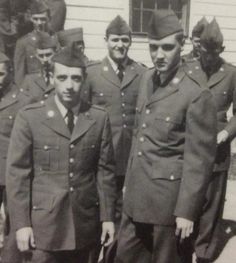 black and white photograph of men in uniforms