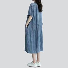 Make a statement with our City Flair Striped Long Denim Dress from 2023 Spring-Summer Collection. This couture classic is made with premium quality denim. featuring distinctive vertical stripes. long silhouette. and a buttoned closure for a classic look with an edge.Why You'll Love It Fashionable & Functional: This dress is textured to hug your silhouette while ensuring comfort. The resilient zipper and stylish button duo provide both functionality and trend. Timeless & Trendy: The proven stripe Denim Dresses Online, Long Denim Dress, Womens Denim Dress, Denim Clothing, Current Trends, Dress Images, Long Jeans, Caftan Dress, Lightweight Cardigan