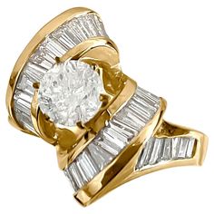 This vintage-style art deco ring features a stunning combination of diamonds set in 14K yellow gold. The centerpiece is a dazzling 1.00 carat round brilliant cut diamond with G color and I2-I3 clarity, complemented by 2.00 carats of baguette-cut side diamonds boasting VS clarity and F color. With a total carat weight of 3.00 carats, all diamonds are 100% natural earth mined. The ring's slight twist design adds dimension and elegance, making it a perfect choice for engagements and special occasions. Ring resizing is available to ensure a perfect fit. Key Features: Metal: 14K yellow gold. 1.00 carat center diamond. I2-I3 clarity and G color, round brilliant cut. 2.00 carat side diamonds. VS clarity and F color, baguette cut. Total carat weight of diamonds: 3.00 carats. 100% natural earth min Vintage Style Art, Modern Engagement Rings, Deco Ring, Modern Ring, Art Deco Engagement Ring, Art Deco Diamond, Art Deco Ring, Engagement Rings Sapphire, Gold Engagement Rings