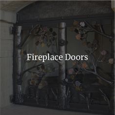 the fireplace doors are decorated with metal branches