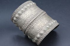 Fantastic Bracelet, Offering you Turkmen traditional silver cuff bracelet. Its 100% hand crafted workmanship with beautiful carved design. this bracelet made approximately 1940s.  please do not hesitate to contact me if you have any questions or further information.  Please visit my store for more beautiful items, Measures :  Opening of the mouth : Inches 1.8" ( 4.5 cm ) Inner circumference : Inches 6.3" ( 16cm ) Width : Inches 3.2" ( 8 cm ) The Weight : 102.6 Grams, Carved Bangle Cuff Bracelet For Weddings, Traditional Silver Carved Cuff Bracelet, Ornate Cuff Bracelet For Festivals, Silver Carved Bracelet For Ceremonial, Traditional Etched Silver Bracelets, Ornate Carved Bangle Cuff Bracelet, Traditional Carved Bracelets For Wedding, Traditional Carved Wedding Bracelets, Ornate Engraved Bracelets For Festivals