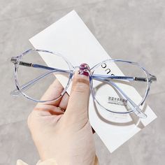 Introducing the Vera Round Glasses - where classic elegance meets modern style. Crafted from premium TR material, these glasses are lightweight yet durable, making them perfect for daily wear. The narrow fit and versatile design complement Square, Heart, Oval, and Oblong face shapes, ensuring a flattering look for everyone. Available in four stunning colors - Champagne, Grey, Black Gold, and Blue - the Vera Round Glasses offer a chic option for every personality. Whether you're dressing up for a special occasion or adding a touch of sophistication to your everyday ensemble, these glasses are the perfect accessory. Measurements: 51-16-146 Features: *Fits Square, Heart, Oval, and Oblong face shapes *Comfortable narrow fit *Made from high-quality TR material *Available in Champagne, Grey, Bla Kaleidoscope Glasses, Cute Glasses Frames, Glasses Frames Trendy, Classy Glasses, Fancy Glasses, Clear Glasses Frames, Glasses Trends, Round Eyewear, Trendy Glasses