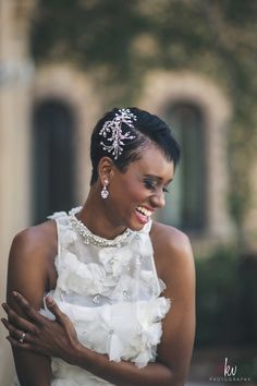 an evening of wedding bliss with the bride smiling and holding her arms around her chest