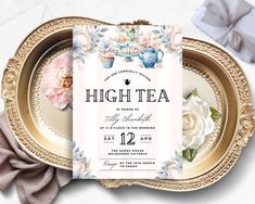 an elegant tea party with flowers and gold plates