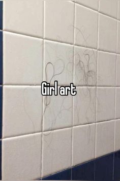 the word girl art written in white tiles