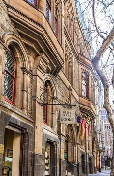 an old building on the corner of a street