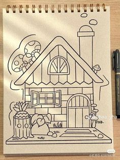 a drawing of a house is shown on a piece of paper