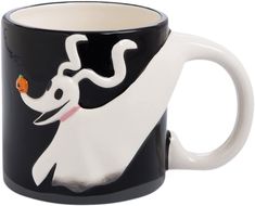 a black and white coffee mug with a ghost on it