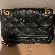 Hi! I’m Selling A Tory Burch Fleming Leather Handbag. Super Cute! Great Condition Leather Double Flap Bags For Shopping, Black Leather Double Flap Bags, Designer Double Flap Bag With Leather Lining, Chic Double Flap Soft Leather Bag, Chic Soft Leather Double Flap Bag, Chic Black Double Flap Shoulder Bag, Designer Soft Leather Shoulder Bag In Tan, Chic Tan Bag For Everyday Luxury, Tan Satchel Bag With Magnetic Closure