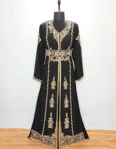 Mashallah! ❤️ Modest V neck Moroccan Style embroidered kaftan Black 👗 Order Online latest Embroidered Kaftan which are made up from best quality fabrics with latest styles from our large collections at https://bit.ly/3eafqPe Shop Now : https://bit.ly/35e17YL Buy online @ $109 #arabicshop #turkishcaftans #beautifulkaftans #arabickaftandresses #pakistanikaftan #middleeasternclothingnearme #traditionalarabicdress #cheapislamicclothing #turkishcaftan #arabicsuit #arabgown #kaftanparty Luxury Traditional Festive Thobe, Luxury Dabka Work Floor-length Kaftan, Luxury Embroidered Floor-length Kaftan, Luxury Traditional Thobe With Dabka, Luxury Traditional Long Thobe, Luxury Long Thobe With Gold Embroidery, Luxury Long Ceremonial Thobe, Luxury Embroidered Gold Thobe, Luxury Embroidered Evening Thobe