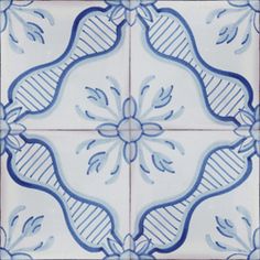 a blue and white tile with an intricate design