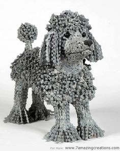 a sculpture of a poodle made out of yarn