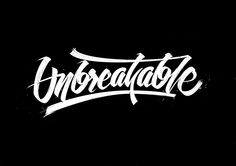 the word unbreakable written in white ink on a black background with some type of lettering