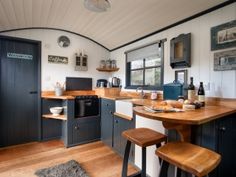 the kitchen is clean and ready to be used as a dining room or bar area