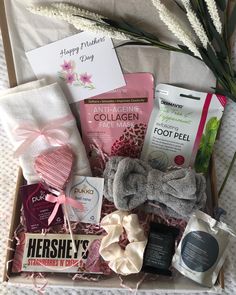 a gift box filled with lots of goodies and personal care items for someone's special occasion