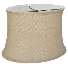 a lamp shade that is on top of a table