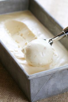 a scoop of ice cream in a metal container